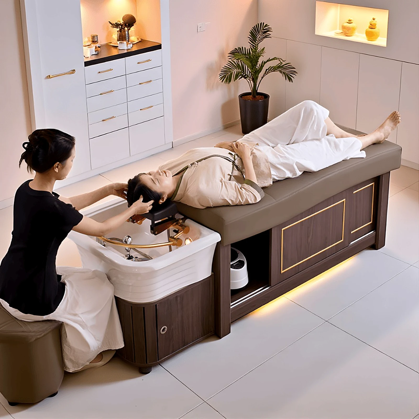 Head spa ritual on the Aoi table: therapist at the basin, client at rest