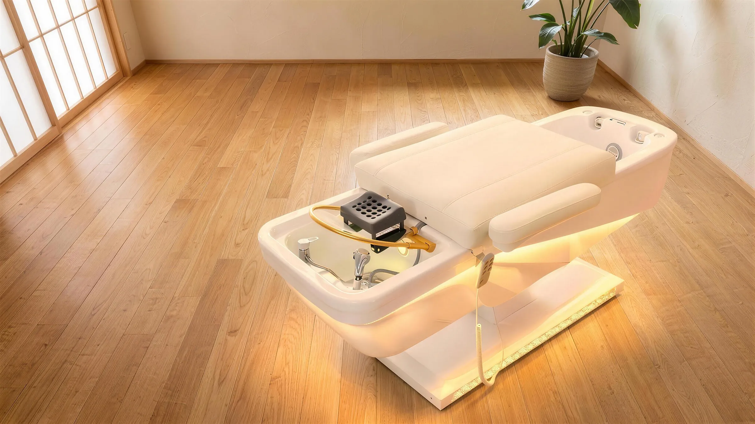 Kogane head spa table with open ceramic basin in a Japanese-minimalist salon