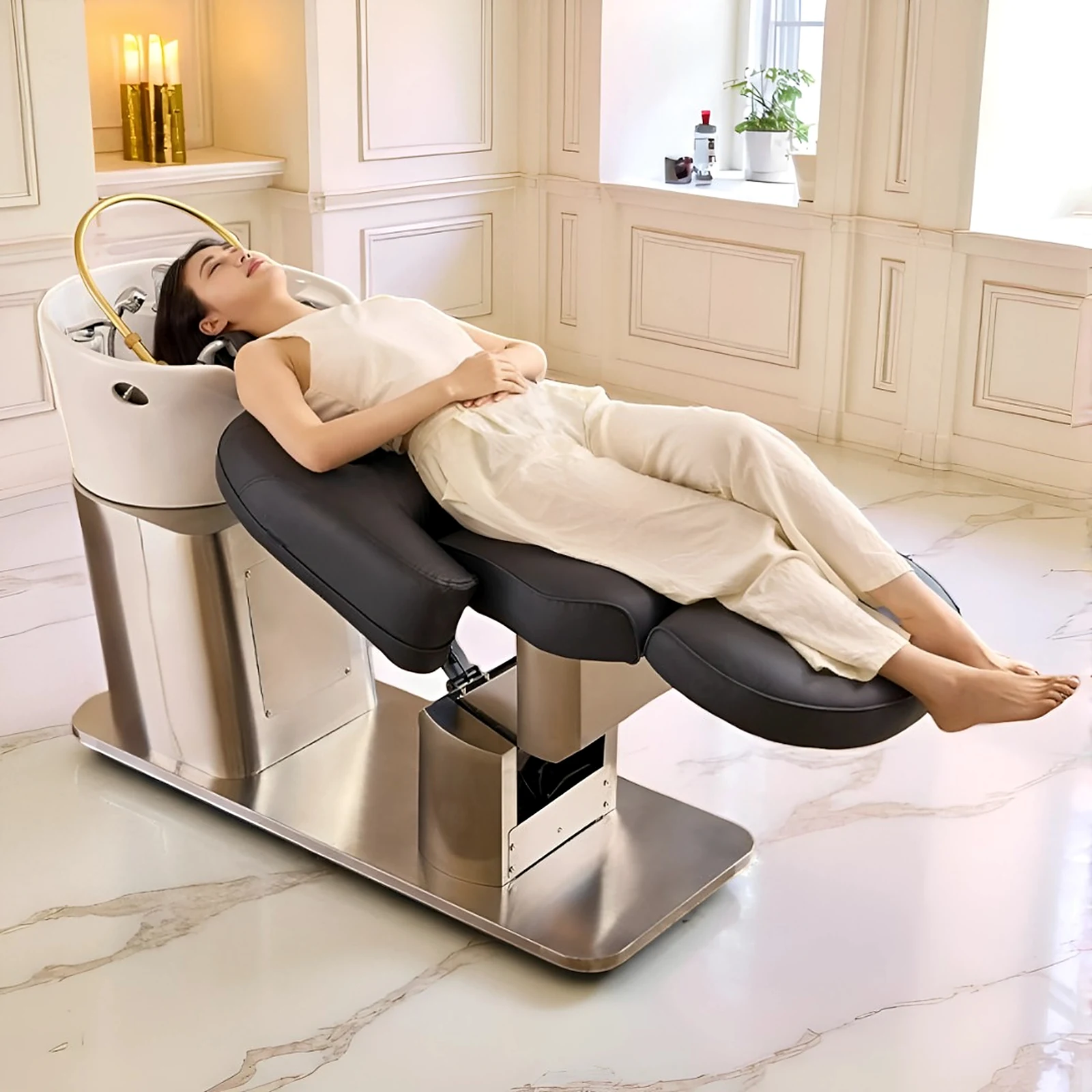 Client at rest in the Kohaku head spa chair, arch over the basin